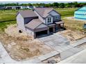 Aerial view of a two-story new construction home in a suburban neighborhood at 196 Aster Way, Greenfield, IN 46140
