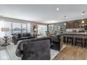 Open-concept living area seamlessly connects the kitchen, dining, and living spaces at 19600 Atwater Ave, Sheridan, IN 46069