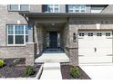Close up of the front porch showing the entrance and brick facade at 2168 Hengist Dr, Westfield, IN 46074