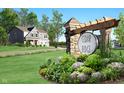 Welcome to Cedar Ridge! Beautiful landscaping at the entrance to the community at 300 Atlas Dr, Lebanon, IN 46052
