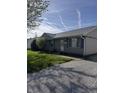 A cozy single-story home with vinyl siding and manicured front yard at 369 Northfield Dr, Mooresville, IN 46158