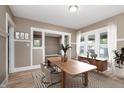 Bright dining area with modern table, stylish chairs, and ample natural light at 5074 E Walnut St, Indianapolis, IN 46201