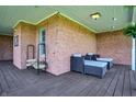 Inviting covered porch with comfortable seating, perfect for relaxing and enjoying the outdoors at 5299 W Pr Black Hawk, Edinburgh, IN 46124