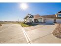 Beautiful single-story home with a two car garage, long driveway, and well manicured lawn at 6204 Fairview Dr, McCordsville, IN 46055