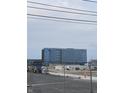 Modern office building with large windows and a sleek design under a cloudy sky at 644 Warren Ave, Indianapolis, IN 46221