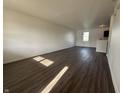 Open living area with hardwood floors, white walls, recessed lighting, and lots of natural light at 1539 Egret Ln, Greenwood, IN 46143