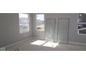 Bright room with large windows offers a blank canvas for customization at 16830 Silo Meadows Dr, Noblesville, IN 46060
