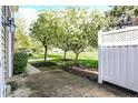Inviting fenced backyard with an outdoor patio perfect for enjoying the beautifully landscaped surroundings at 2270 Brightwell Pl, Indianapolis, IN 46260