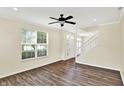 Bright living room with wood flooring, neutral walls, and a ceiling fan at 2270 Brightwell Pl, Indianapolis, IN 46260