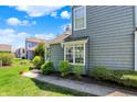 Charming home featuring lush greenery, well-manicured lawn and welcoming curb appeal at 2809 Somerset Bay # 41, Indianapolis, IN 46240