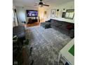 Comfortable living room with a large sectional sofa and modern decor at 6226 Fairlane Dr, Indianapolis, IN 46259