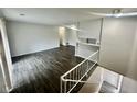 Bright living room featuring hardwood floors and a modern design at 6458 Lupine Ter, Indianapolis, IN 46224