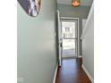 Light-filled entryway features hardwood floors and a staircase leading to the upper level at 1175 Bent Tree Way, Plainfield, IN 46168