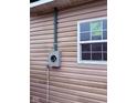 Exterior detail showcasing an electrical box and a window at 1309 W Memorial Dr, Muncie, IN 47302