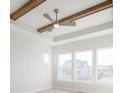 Well lit bedroom with a ceiling fan, tray ceiling and a great view of the backyard at 19590 Wood Farm Pl, Westfield, IN 46074