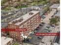 View of the building from above highlighting the adjacent parking with back entrance access at 230 E 9Th St # 401, Indianapolis, IN 46204