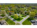 Aerial view of a 0.42 acre property in Greenwood, IN, surrounded by lush trees at 273 N Serenity Way, Greenwood, IN 46142