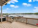 Spacious wooden deck overlooking the lake, perfect for outdoor dining and relaxation at 3646 Beach Blvd, Cicero, IN 46034
