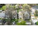 Aerial view showcasing the houses and their placement along the street at 433 Jefferson Ave, Indianapolis, IN 46201