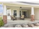 Relaxing porch with comfortable seating, perfect for enjoying the outdoors at 5007 Avian Ln, Indianapolis, IN 46235