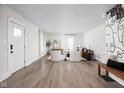 Spacious living room with ample seating and natural light at 611 Tecumseh St, Indianapolis, IN 46201