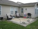 Back patio with comfortable seating, ideal for outdoor relaxation and entertaining at 6350 Emerald Springs Dr, Indianapolis, IN 46221