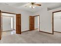 Spacious bedroom with neutral carpet, ceiling fan, and wood trim throughout at 793 Shepherds Way, Greenwood, IN 46143