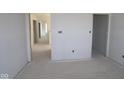 Spacious interior with smooth walls and an open floor plan, ideal for customization and modern living at 10145 Redwood Peak Ln, Indianapolis, IN 46259
