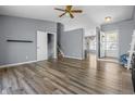 Open-concept living room boasting modern flooring, ample natural light, and easy access to other living spaces at 18771 Northridge Dr, Noblesville, IN 46060