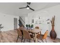 Dining room features an modern ceiling fan and neutral decor at 5924 Skyward Ln, Indianapolis, IN 46234