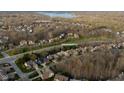 Aerial view of neighborhood homes near Geist Reservoir, highlighting a beautiful residential area at 9626 Oakhaven Ct, Indianapolis, IN 46256