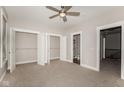 An airy bedroom with neutral tones and carpeted floor plus closet and en suite bath at 4077 Rookwood Ave, Indianapolis, IN 46208