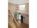 Bright, two-story foyer featuring a staircase, chandelier, and a view of the front door, creating a welcoming entrance at 5702 Saratoga Pl, Plainfield, IN 46168