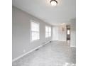 An open-concept living room with abundant natural light and spacious design at 270 S Lasalle St, Indianapolis, IN 46201