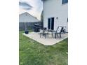 Outdoor patio area perfect for entertaining, featuring a grill and comfortable seating at 326 Virginia St, Fortville, IN 46040