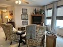 Cozy living room featuring comfortable seating, neutral decor, and great natural light at 11875 Buck Creek Cir, Noblesville, IN 46060