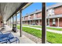 View from porch showcasing the charming townhouses and courtyard at 1476 N Illinois St, Indianapolis, IN 46202