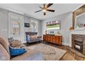 Inviting living area featuring hardwood floors and a decorative fireplace at 1476 N Illinois St, Indianapolis, IN 46202