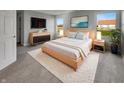 Well-lit main bedroom featuring a comfortable bed, stylish furnishings, and great natural light at 2338 Keystone Ct, Anderson, IN 46011