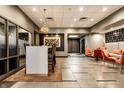 Bright lobby featuring comfortable seating, stylish decor, modern lighting, and easy elevator access at 333 Massachusetts Ave # 204, Indianapolis, IN 46204