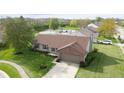 An aerial view of the lovely home, highlighting the manicured lawn and inviting curb appeal at 2102 Coldwater Cir, Indianapolis, IN 46239