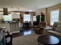 Open-concept living room and kitchen, ideal for entertaining and Gathering gatherings at 2143 N Graham Ave, Indianapolis, IN 46218