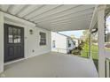 Spacious covered porch offering neighborhood views and an inviting entrance at 2333 Calhoun St, Indianapolis, IN 46203