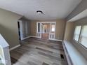 Comfortable living room with decorative columns offers an open and inviting space at 2819 W 16Th St, Indianapolis, IN 46222