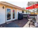 A deck for relaxing, grilling, and eating while enjoying the backyard at 598 Collier St, Columbus, IN 47201