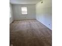 Neutral bedroom with a window providing natural light and carpeted flooring throughout at 7140 Avalon Trail Dr, Indianapolis, IN 46250