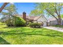 Attractive single-Gathering home with a brick chimney, and large front lawn at 4322 Matrea More Ct, Indianapolis, IN 46254