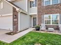 Charming front porch with stylish chairs and landscaped garden, perfect for relaxing at 546 Freedom Dr, Pittsboro, IN 46167