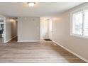 Open living room space with hardwood floors and a bright atmosphere at 828 N 13Th St, Elwood, IN 46036