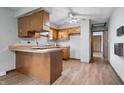 Kitchen with a breakfast bar that opens to the dining area at 1953 N Alton Ave, Indianapolis, IN 46222